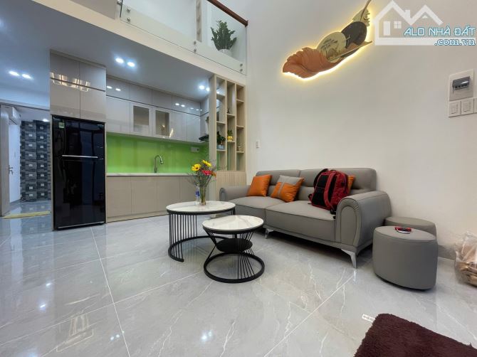 BÁN NHÀ 2 TẦNG MỚI TINH - CẠNH PHỐ HUỲNH NGỌC HUỆ - FULL NỘI THẤT XỊN SÒ, XÁCH VALI VÀO Ở - 1