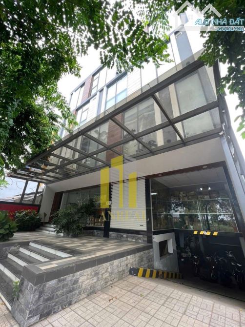 Tòa Văn Phòng Hầm 4 Lầu Mặt Tiền Đường Đồng Văn Cống 900m2 Giá 140 Triệu - 1
