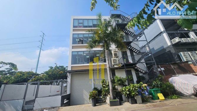 Tòa Văn Phòng Hầm 4 Lầu Mặt Tiền Đường Đồng Văn Cống 900m2 Giá 140 Triệu - 2