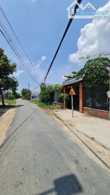 Bán nhà 2 lầu Mặt Tiền Đường Long Phú,  Tân Kim, thị trấn Cần Giuộc:  DT 100m2 - 14