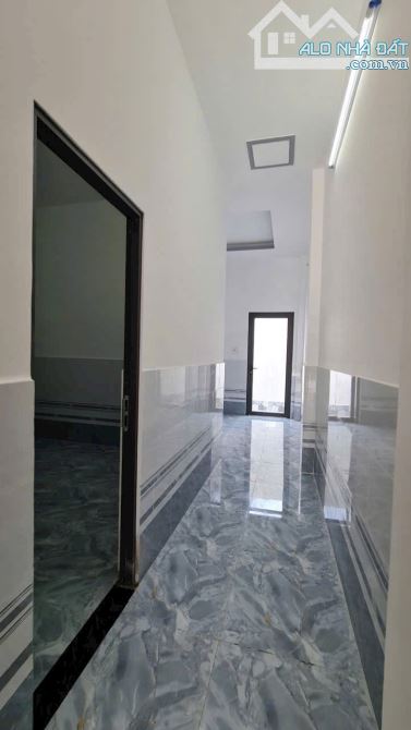 Bán nhà 2 lầu Mặt Tiền Đường Long Phú,  Tân Kim, thị trấn Cần Giuộc:  DT 100m2 - 2