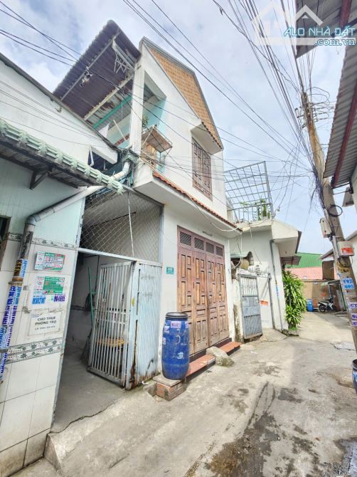 Bán nhà 1T1L và phòng trọ 9x15m, hẻm Nguyễn Đức Thiệu p. Dĩ An, thu 12tr/th - 3