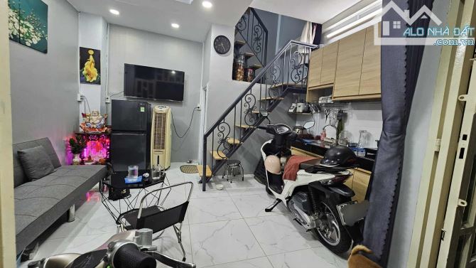 Bán nhà hẻm Thạch Lam,P.Phú Thạnh,Q.Tân Phú,dt: 4 x 5 nhà xây 2 lầu 2 Tỷ 45.