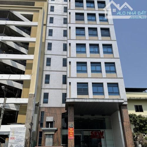 Tòa nhà văn phòng 12 tầng: - Vị trí siêu đẹp Trung tâm quận Tân Bình, mt 40 Hoàng Việt