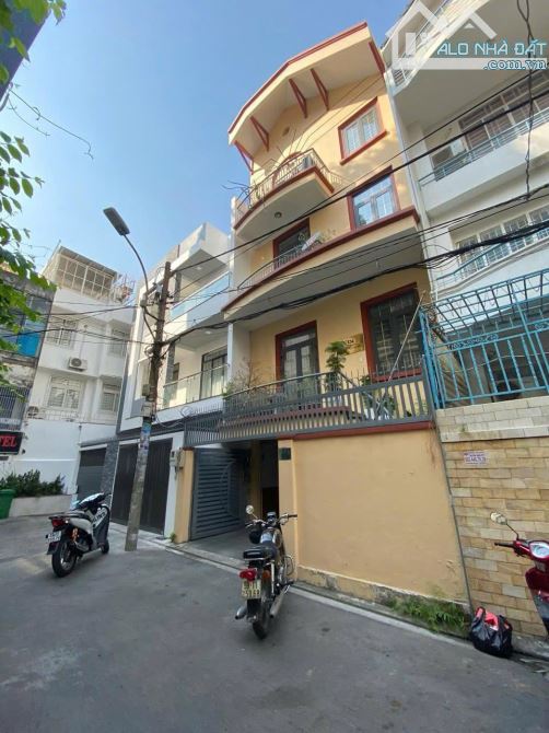 Cần bán nhà hẻm nhựa 8m đường Trường Sơn--Hồng Hà---DT: 6x20m--4 tầng-- giá 22 tỷ
