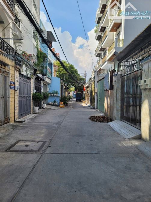 BÁN NHÀ Q.7 - XE HƠI 7 CHỖ ĐẬU CỬA - 4 X 15M, 3 TẦNG - 7.1 TỶ