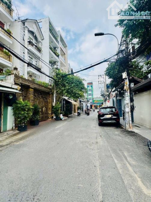 NHÀ 4 TẦNG KIÊN CỐ ĐƯỜNG NHÁNH LÊ VĂN THỌ-NGAY CV LÀNG HOA-DT 8Mx20M-Ô TÔ NGỦ TRONG NHÀ - 1