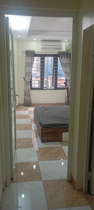 NHÀ NGỌC THUỴ 5 TẦNG - CÁCH 1 NHÀ RA PHỐ - GẦN TRƯỜNG CHỢ - 2