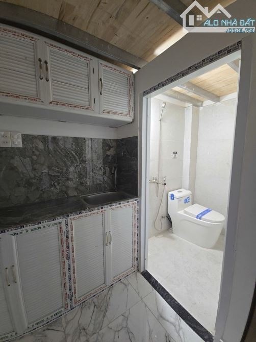 CHDV - 19 PHÒNG - THANG MÁY - MẶT TIỀN THẠNH LỘC 15 - 6 TẦNG - 148M2 - GIÁ 14,5 TỶ - 3