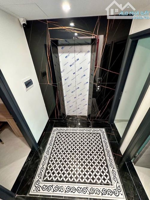BÁN TÒA NHÀ DÒNG TIỀN LÊ ĐỨC THỌ PHÚ MỸ LÔ GÓC Ô TÔ 100M2 x 8T 25PKK FULL NỘI THẤT GIÁ 28 - 1
