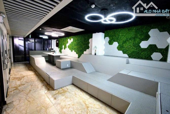 Toà nhà mặt tiền Phan Đăng Lưu Quận Phú Nhuận,DT:6,5x30 kc: hầm 6T thu nhập 200tr/th - 6