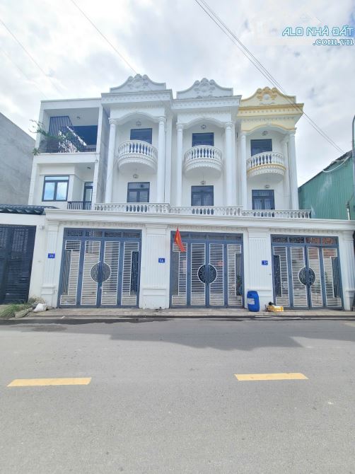 Bán nhà 1 trệt 2 lầu MT kinh doanh p.Tân Đông Hiệp Tp.Dĩ An giá 5ty TL M6982