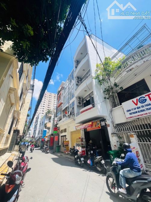 Bán nhà 5 tầng  Nguyễn Gia Trí    .DT 78 m2. Giá 21.5 tỷ ,P25 Bình Thạnh - 6