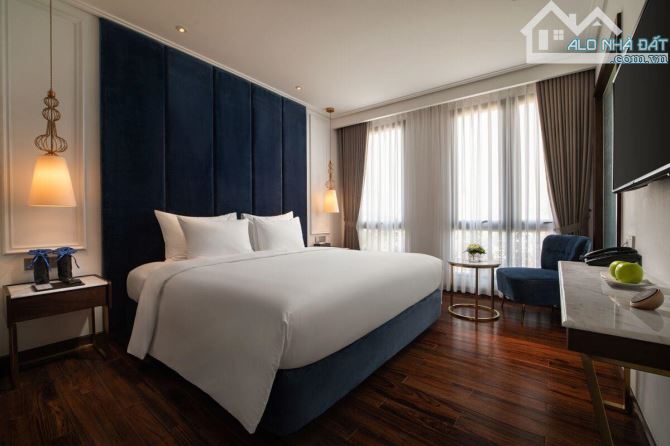 Bán tòa khách sạn phố Nguyễn Trường Tộ, DT 180m2 x 15 tầng MT 8m - doanh thu 20 tỷ/năm - 7