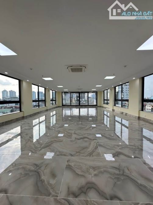 Bán tòa nhà 8 tầng thang máy đường Nguyễn Viết Xuân, 95m2, 2 mặt tiền 5,3m, View hồ KD - 1