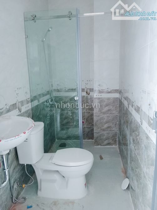 Bán nhà sổ hồng riêng, vay bank, 1 trệt, 2 lầu, 4 phòng ngủ - 6