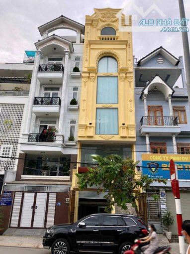 Nhà MT Phạm Huy Thông - Dương Quảng Hàm, P.6, GV. DT: 5m x 16m Hầm trệt 5 lầu, giá: 23,5ty