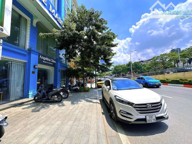 TÒA NHÀ VĂN PHÒNG 8 TẦNG THANG MÁY MẶT PHỐ NGUYỄN CHÍ THANH ĐỐNG ĐA CỰC ĐẸP 90m 61 TỶ - 1