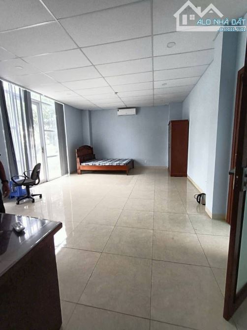 CHO THUÊ TOÀ NHÀ THANG MÁY MẶT TIỀN NGUYỄN VĂN CỪ ND - 1