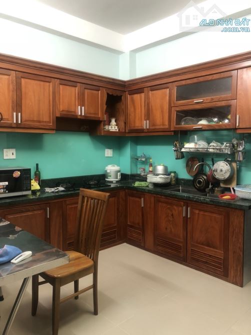 Hẻm xe hơi đậu nhà, 6 tầng, 11 CHDV phòng khép kin đang chờ thuê khoán 43tr /tháng - 2
