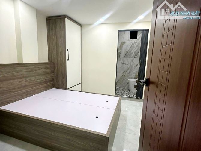 Cần bán nhà đẹp nở hậu 2 lầu 2 phòng ngủ hẻm Trần Hưng Đạo - 2