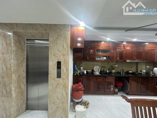 BÁN LIỀN KỀ THANH LIỆT SÁT VĐ3 - SỔ ĐỎ 48m2 7 TẦNG THANG MÁY OTO TRÁNH VỈA HÈ 17.95 tỷ - 2