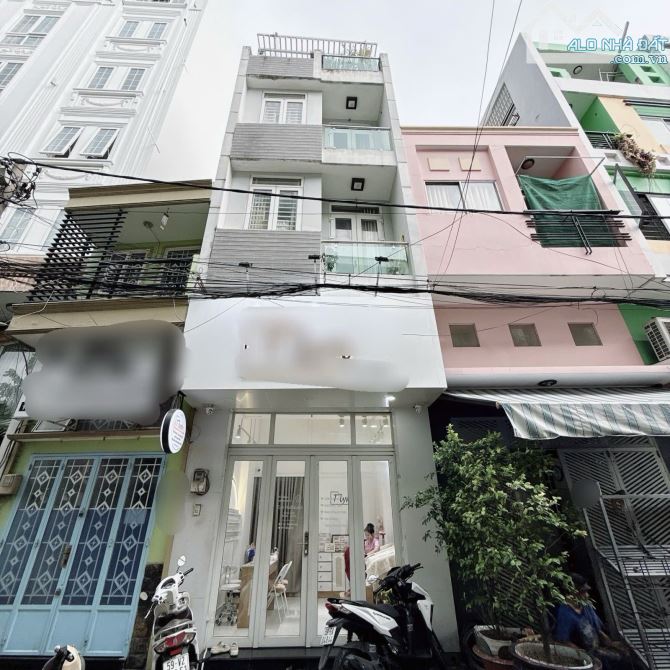 Bán nhà mặt tiền - Phú Nhuận - 50m2 - nở hậu - 5 tầng - thu nhập 420tr/năm