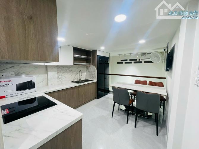 Bán nhà mặt tiền đường Phan Văn Trị Q5 dt(3 x 14m) giá 16 tỷ - 11
