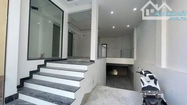Cho thuê nhà 36 Trần Khắc Chân Quận 1 ngang 8x14m hầm 3 lầu giá 90 triệu - 1