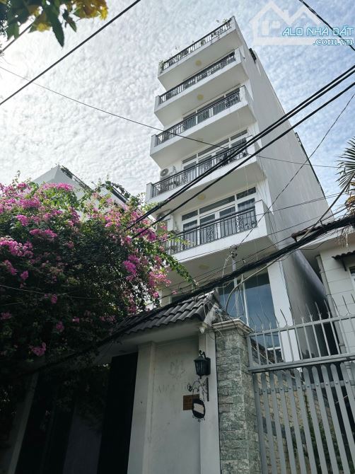 Bán nhà Phú Nhuận - hầm, 7 tầng - nở hậu - thu nhập 1.4 tỷ/năm - 4