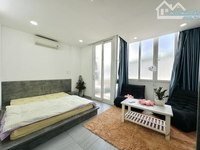 Bán nhà Phú Nhuận - hầm, 7 tầng - nở hậu - thu nhập 1.4 tỷ/năm - 5