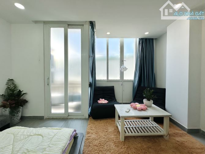 Bán nhà Phú Nhuận - hầm, 7 tầng - nở hậu - thu nhập 1.4 tỷ/năm - 6
