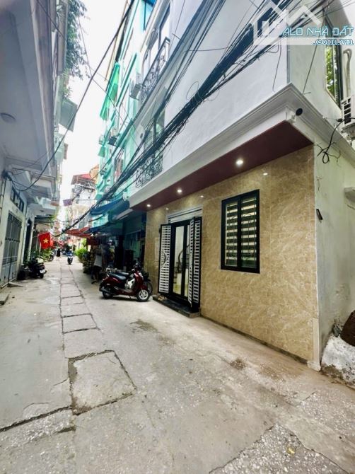 Bán nhà tân Mai 4 tầng ô tô đỗ cửa kinh doanh giá hơn 4 Tỷ