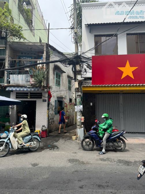 Cho thuê nhà góc 2MT Nguyễn Thị Minh Khai P.5 Q.3 - 11