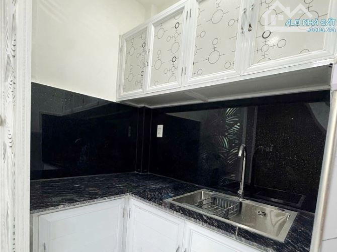 Bán nhà xinh 2 lầu 2 phòng ngủ hẻm Bình Đông, Quận 8 - 1