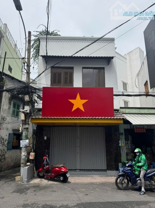 Cho thuê nhà góc 2MT Nguyễn Thị Minh Khai P.5 Q.3 - 12