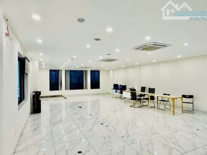 RẺ VIP, chính chủ bán tòa nhà phố Trần Thái Tông 9T. lô góc 122m2*11m MT - 4