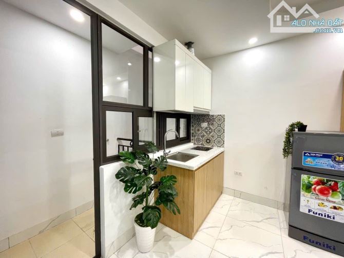 BÁN TÒA CĂN HỘ DỊCH VỤ XUÂN ĐỈNH  75M2, 7 TẦNG TM,19 PHÒNG DOANH THU 110TR/TH, GIÁ 19.7 TỶ - 9