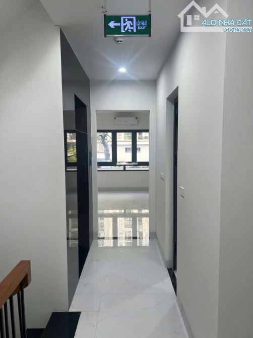 cho thuê nhà phố Nguyễn Tuân dt 80mx 7 tầng, thang máy, ô tô đỗ vòng quanh, 63tr/th