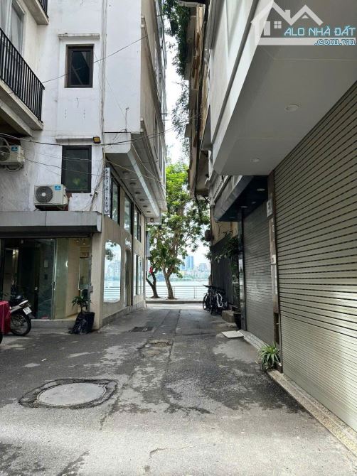 NHÀ 3 THOÁNG Ô TÔ ĐỖ CỔNG VIEW TRỌN HỒ 48M MT 4m 5 TẦNG TRÍCH SÀI 23 TỶ