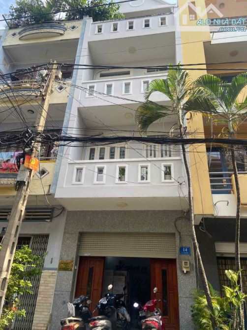 Bán nhà 4 tầng mặt tiền Nguyễn Đình Chiểu, P. 5, Quận 3, (DT: 4x25m, hậu 10,5m) giá 39,5ty - 1