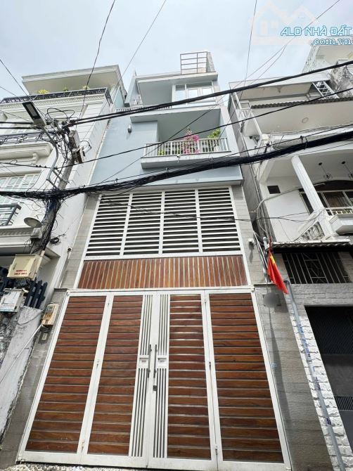 Bán nhà Phú Nhuận - xe hơi thông - nở hậu 6m - 73m2 - 5 tầng - 1