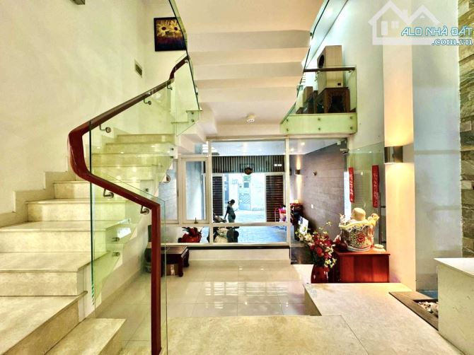 Bán nhà Phú Nhuận - xe hơi thông - nở hậu 6m - 73m2 - 5 tầng - 12