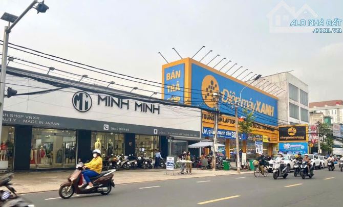 BÁN Toà nhà 4 Lầu Mặt tiền Phạm Văn Thuận ngang 13,6m sổ riêng full thổ cư