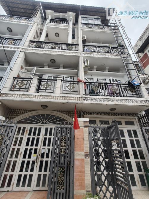 CHDV hẻm xe hơi 102m2 Nguyễn Xí, 7 phòng full NT cao cấp, doanh thu 55tr/tháng