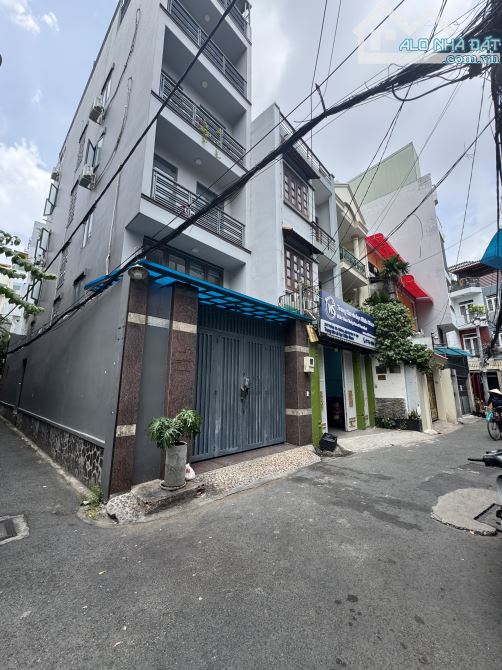 BÁN CHDV 5 tầng. Góc 2MT. 5x20 vuông A4. HXH đỗ. Thu nhập 100tr/th. Sát Sân Bay