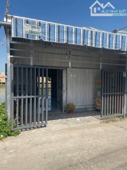Cần tiền xoay gấp ! bán nhanh căn nhà MT ở xã Tân Hiệp , Hóc Môn 87m2 SHR giá 905tr