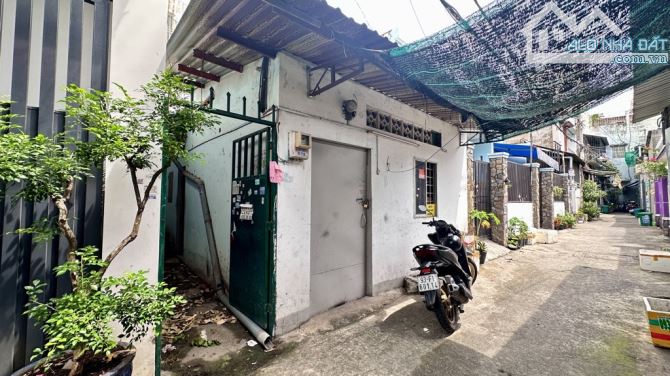 Nhà 1,5 tầng đường TÂN THỚI NHẤT 08 phường TTN Q12 dt 70,1m2 (5,5mx13m), DÒNG TIỀN 10TR/TH