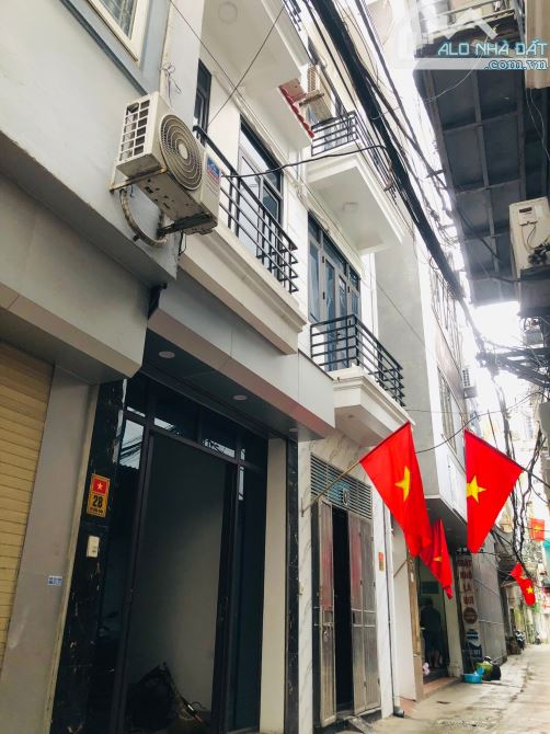 Vũ Tông Phan, 36m x 5 tầng x mt 3m, ô tô đỗ cửa, nhà mới 2 mặt thoáng