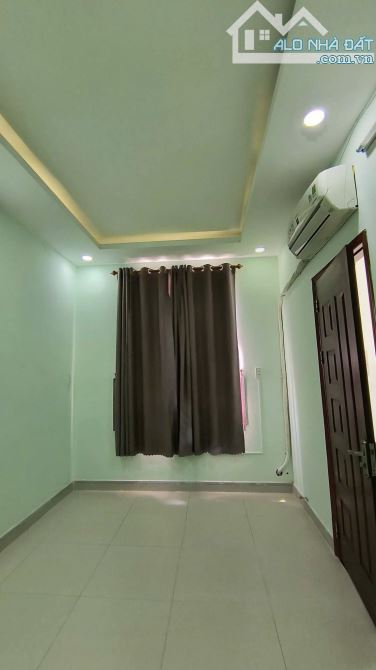Nhà HXT, 1 trệt 2 lầu 4pn 3wc, sẵn máy lạnh. Gần đường Tam Bình - 11